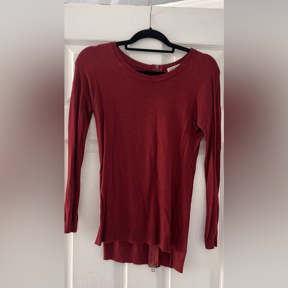 Red sweater with zipper up back